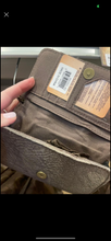 Load image into Gallery viewer, Cowhide Tooled Wristlet Wallets