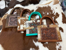 Load image into Gallery viewer, Tooled &amp; Cowhide Bible Carrying Cases
