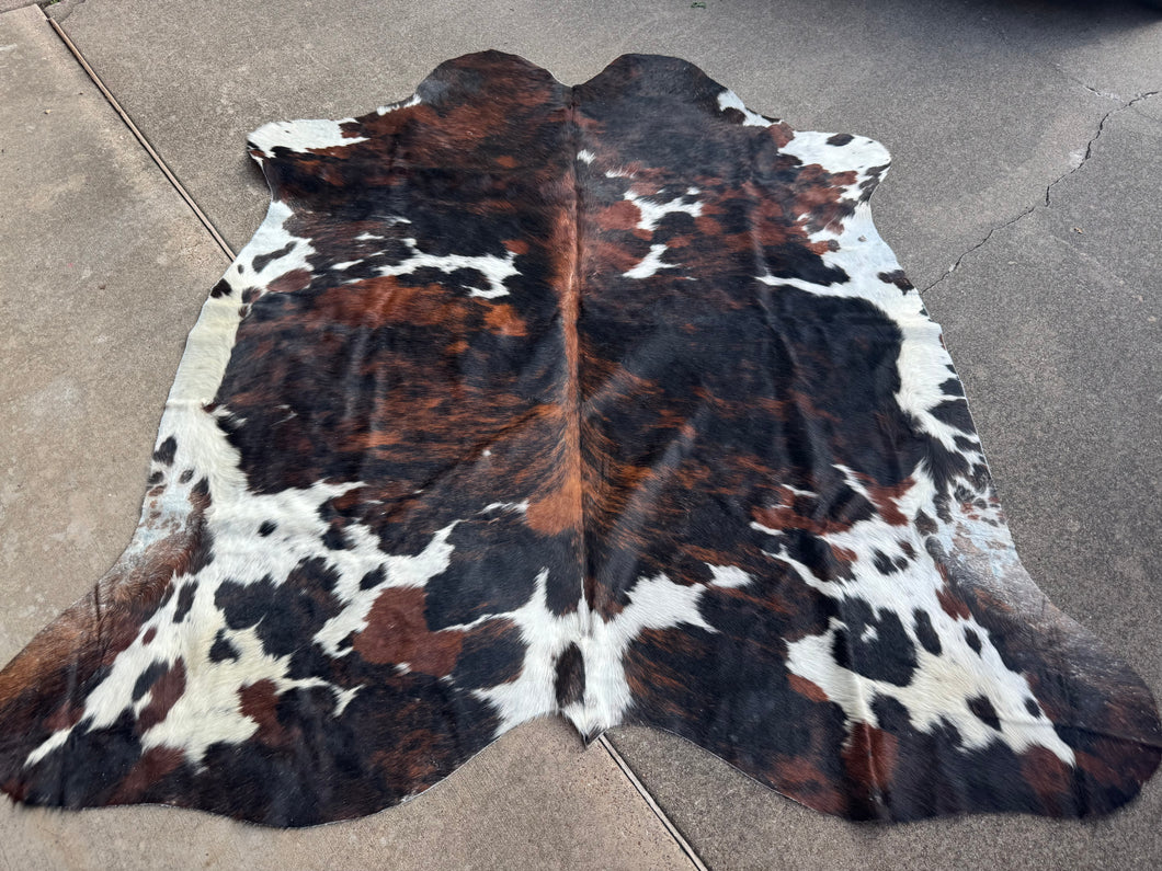 Stunning Tricolor Brindle Splatter Cowhide Rug