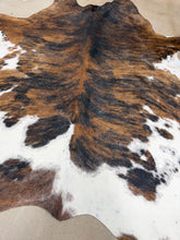 Load image into Gallery viewer, Stunning Tricolor Brindle Splatter Cowhide Rug  71x84”
