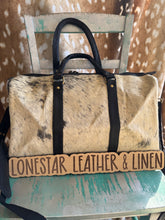 Load image into Gallery viewer, Black &amp; White Cowhide Duffle Overnight Bag
