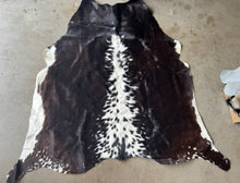 Load image into Gallery viewer, Black Brown &amp; White Spotted Cowhide Rug 53x54”
